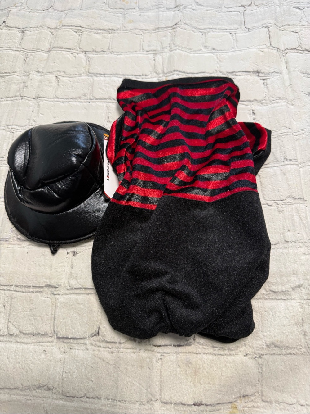 Pet warrior Dog striped red and black shirt and black pants. Halloween custome.